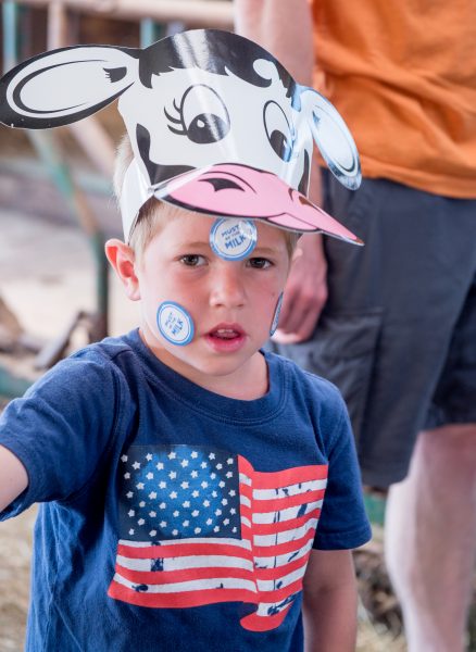 Boy with cow hat and stickers