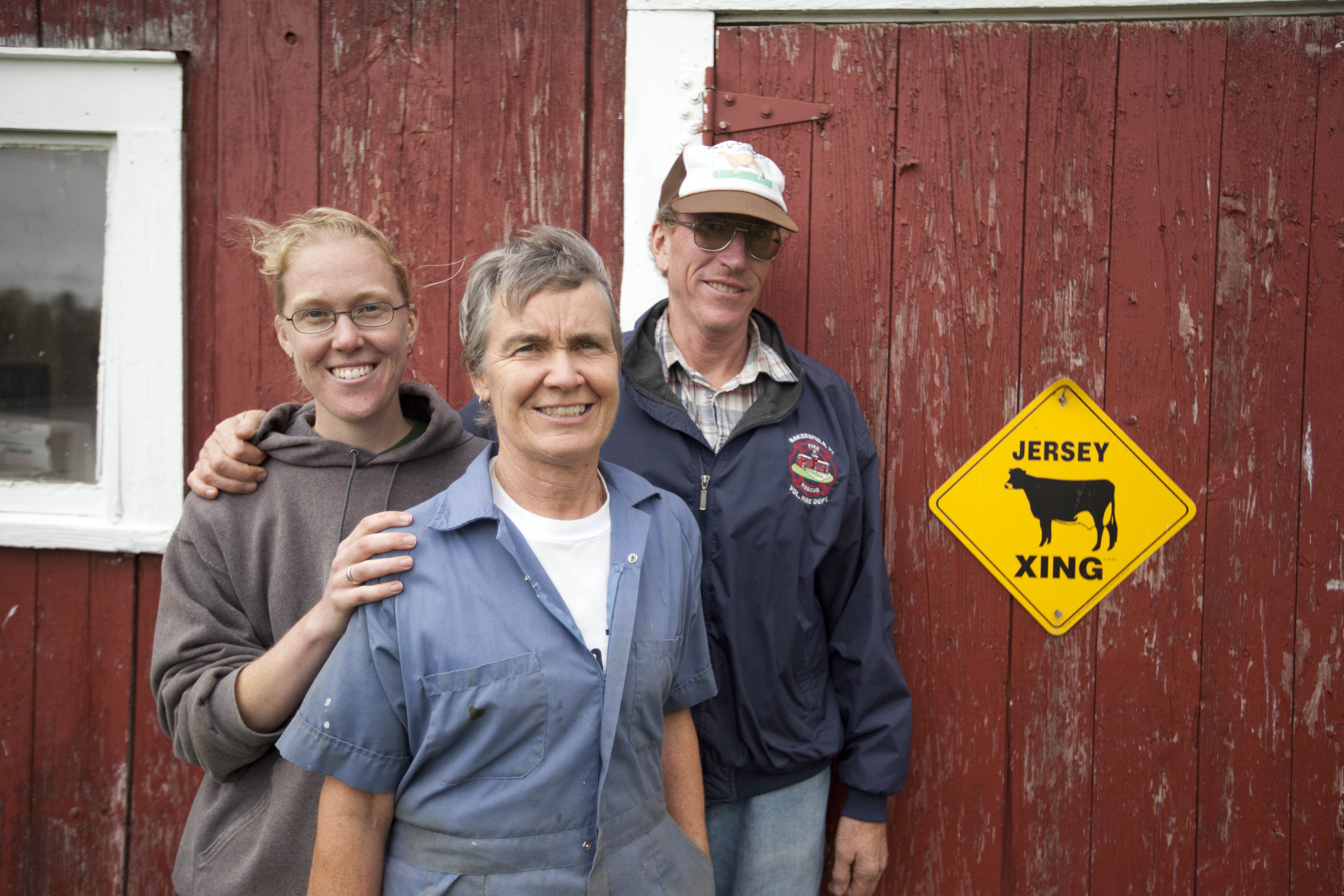 Claire and her parents on their farm in Vermont.