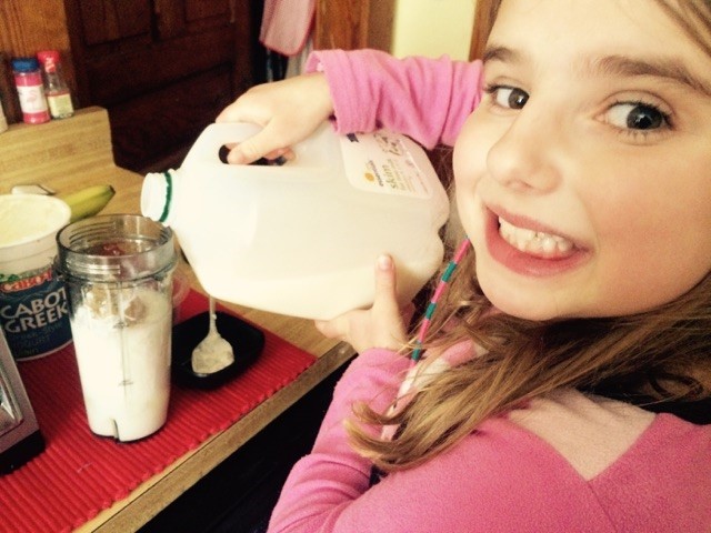 My aspiring chef and baker enjoys testing out new flavors for her morning smoothies!