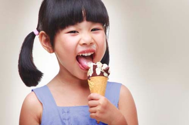 girl eating ice cream cone