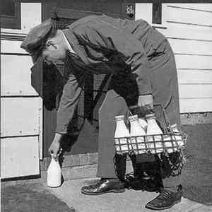 The milkman dropping off milk