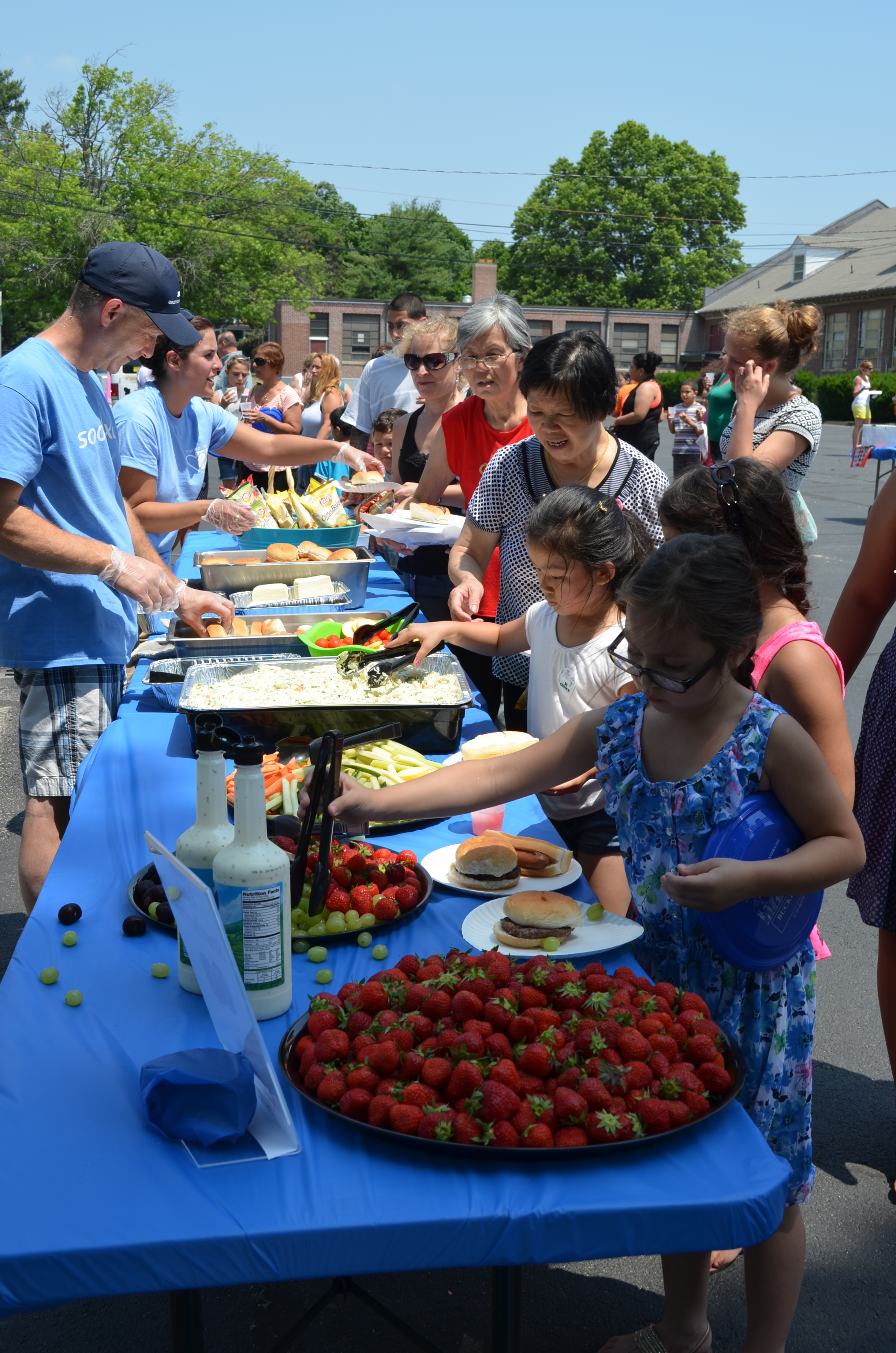 Kids and families getting a summer meal